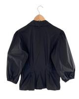 Camisa abotonada puños