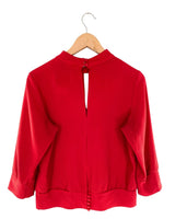 Blusa manga larga con textura