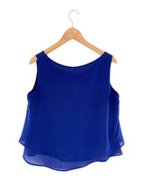 Blusa sleeveless traslucida