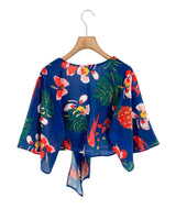 Blusa anudada mangas amplias