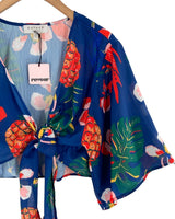 Blusa anudada mangas amplias
