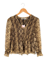 Blusa traslucida encauchada