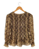 Blusa traslucida encauchada