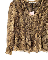 Blusa traslucida encauchada