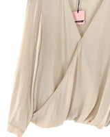 Blusa cruzada manga larga