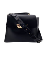Cartera tote flores repujadas