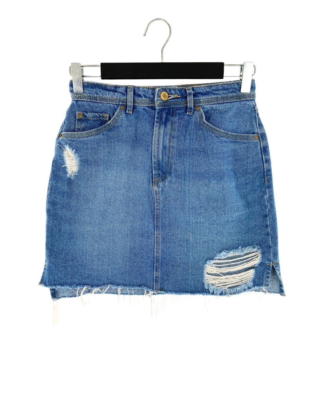 Falda mini en denim rigido