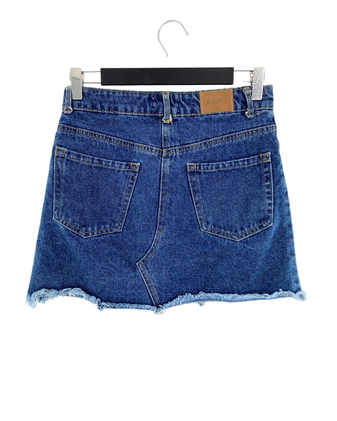 Falda mini en denim rigido