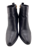 Botines en cuero de tacon