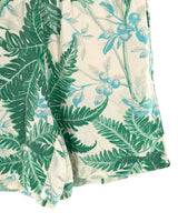 Short mini encauchado print