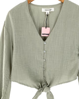 Blusa manga larga con textura