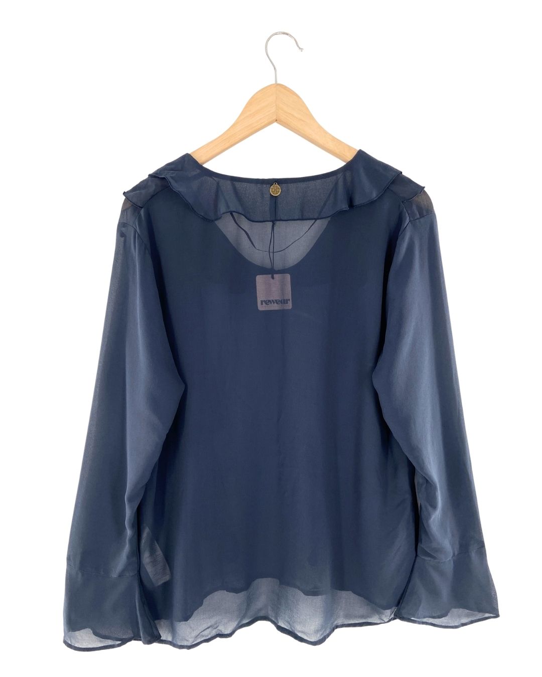 Blusa traslucida con vuelo