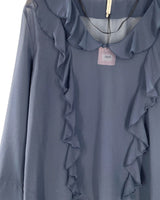 Blusa traslucida con vuelo