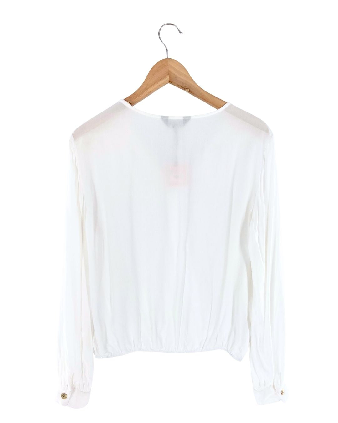 Blusa manga larga cruzada