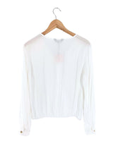 Blusa manga larga cruzada