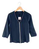 Blusa con cremallera