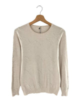 Jersey con detalles en perlas