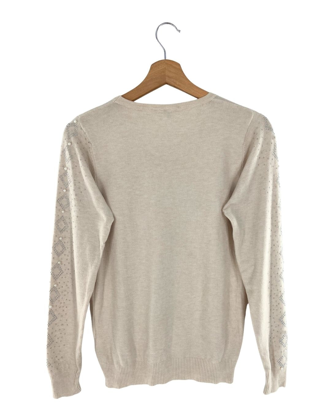 Jersey con detalles en perlas