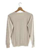 Jersey con detalles en perlas