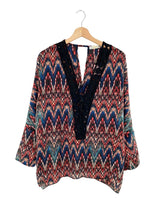 Blusa satinada con guipure
