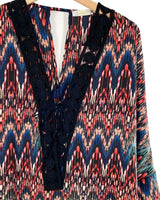 Blusa satinada con guipure