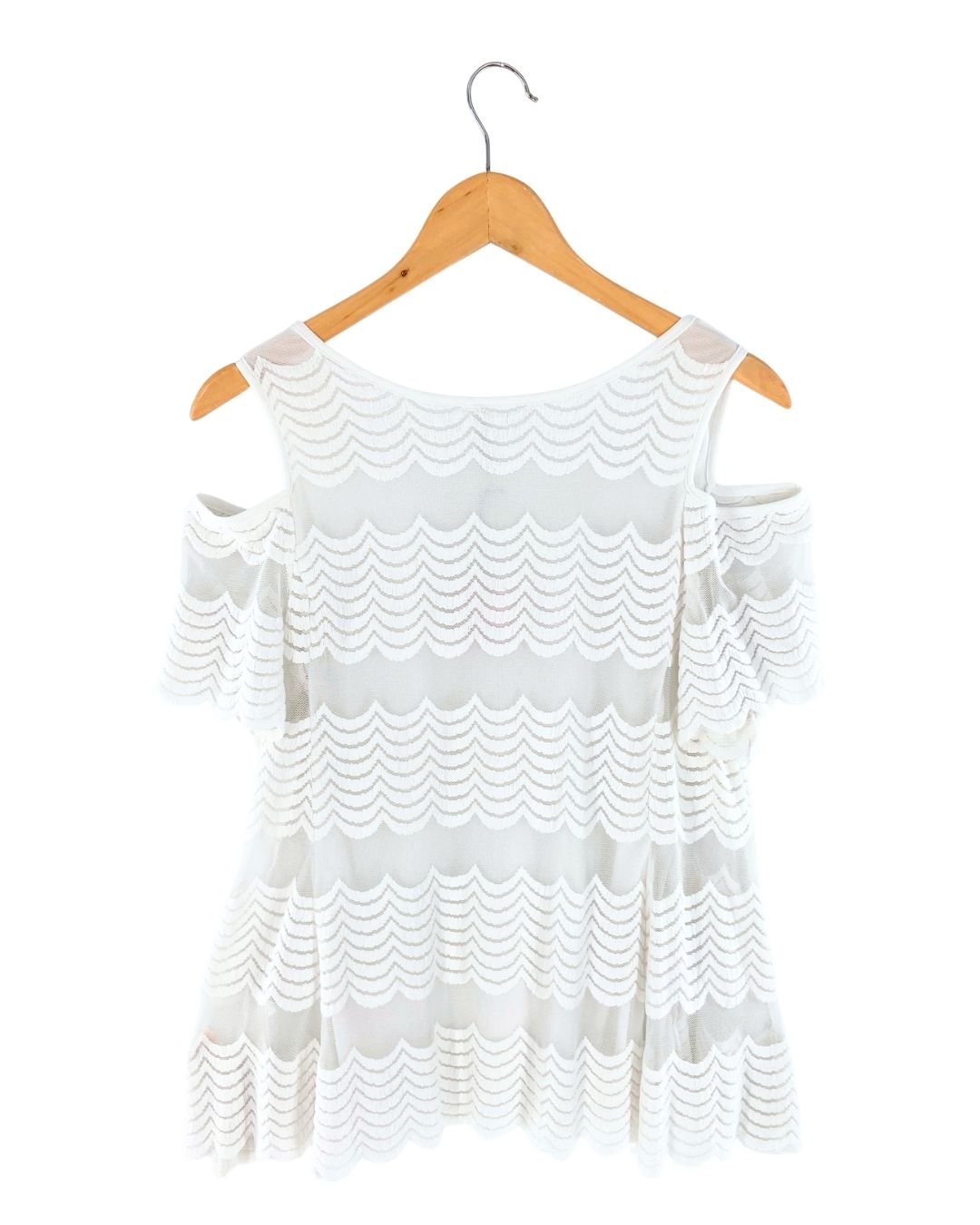 Blusa en mesh bordado cut out