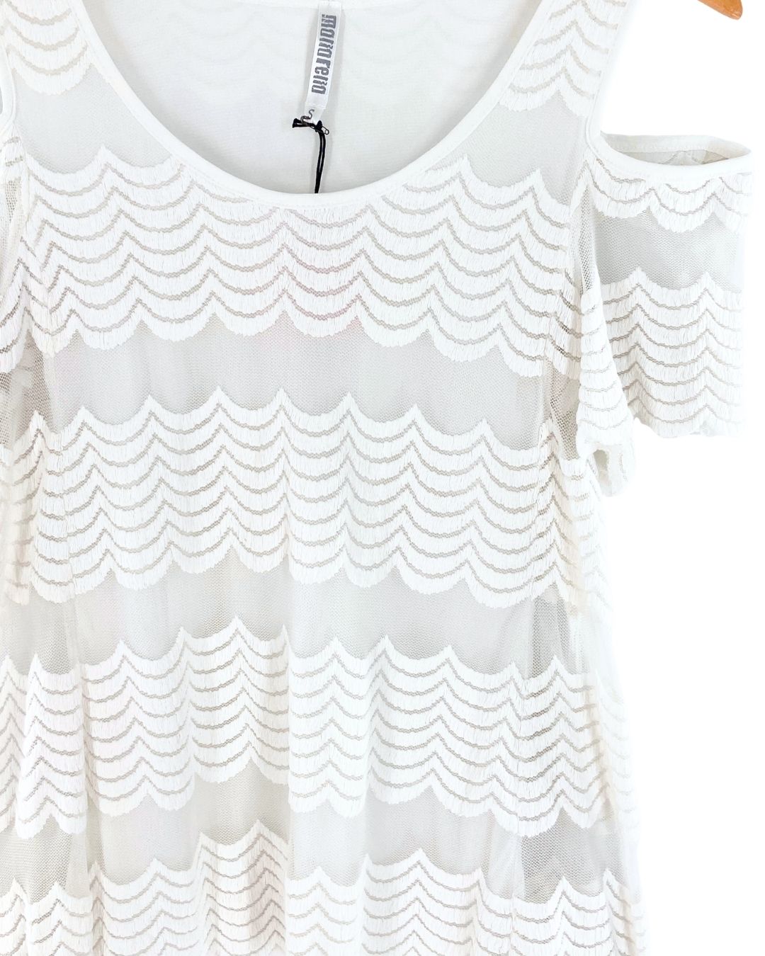 Blusa en mesh bordado cut out