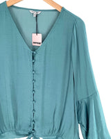Blusa satinada vuelo en puños