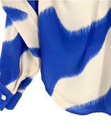 Camisa satinada con anudado