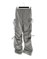 Pantalon parachute encauchado