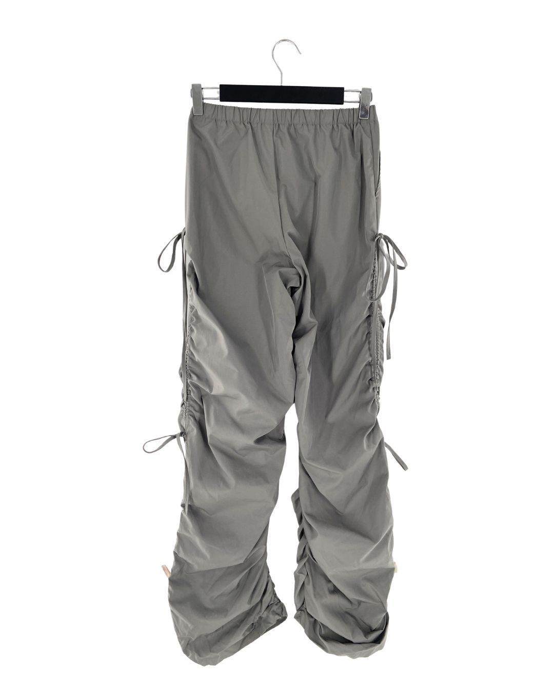 Pantalon parachute encauchado