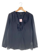 Blusa manga larga traslucida