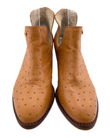 Botines en cuero con taches