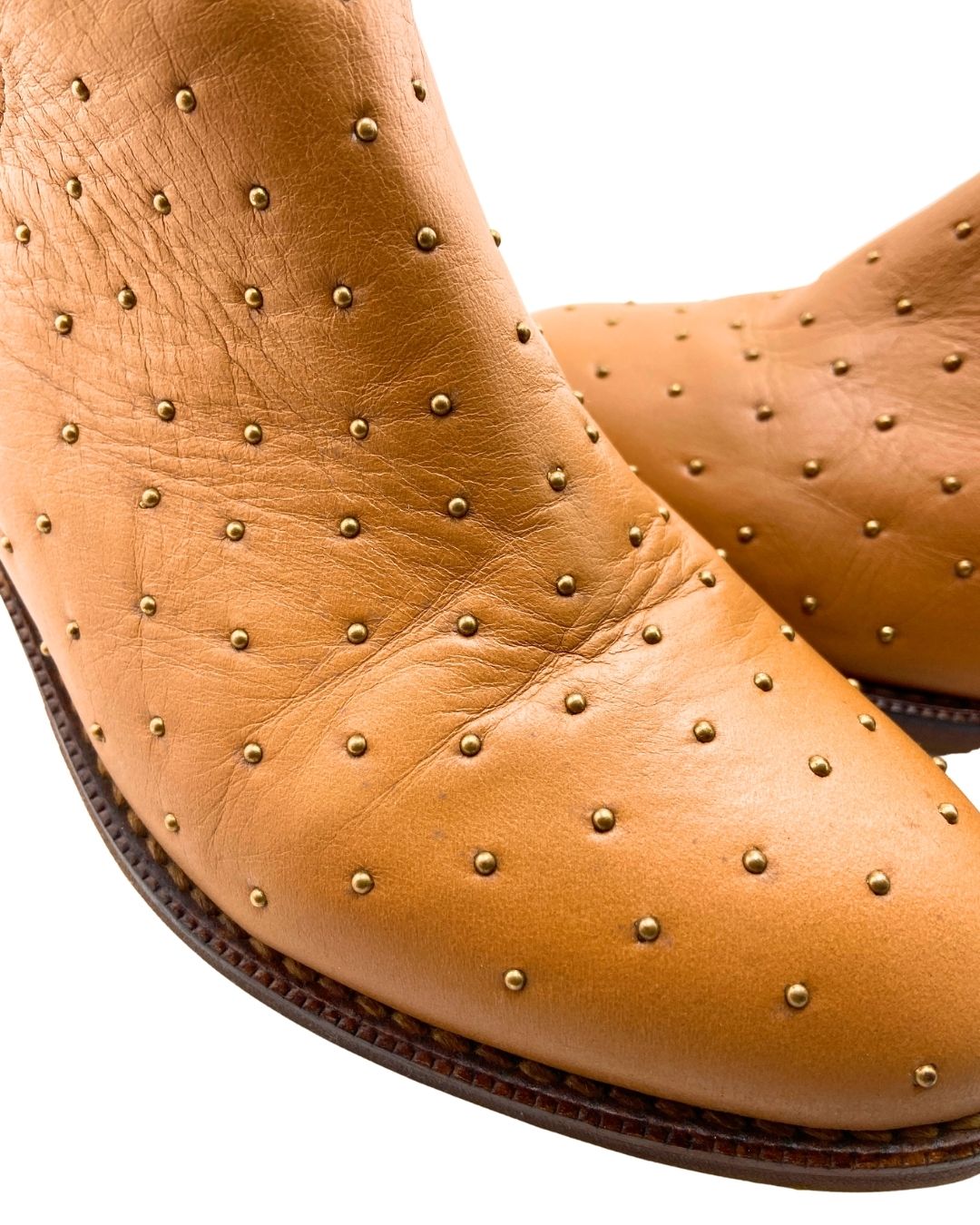 Botines en cuero con taches