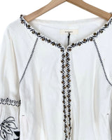 Chaqueta bordada con taches