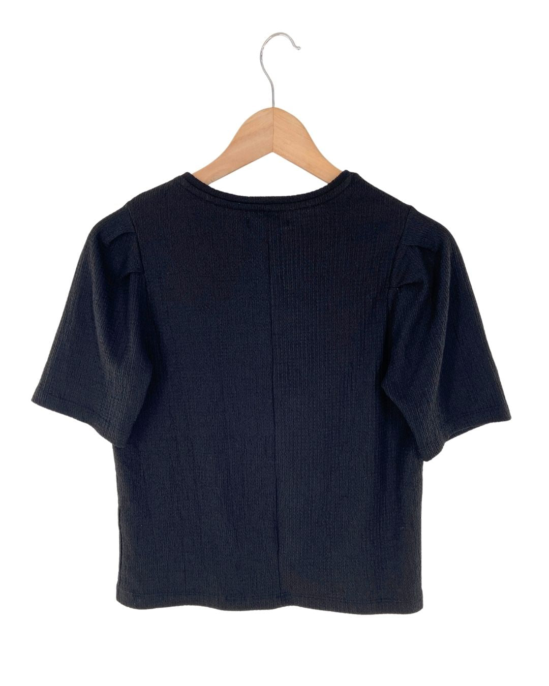 Blusa con textura plisada