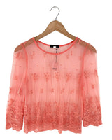 Blusa en mesh con recamado