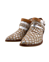 Botines en cuero de tacon