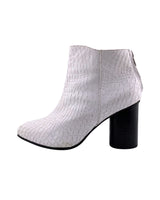 Botines en cuero con textura