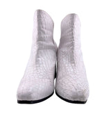 Botines en cuero con textura