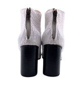 Botines en cuero con textura