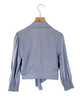Blusa anudada