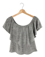Blusa con capa brillante