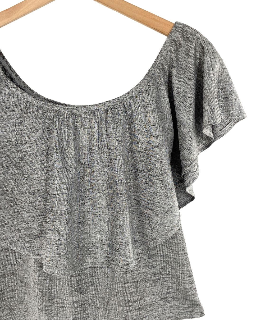 Blusa con capa brillante