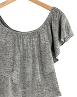 Blusa con capa brillante