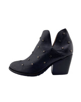 Botines en cuero con taches