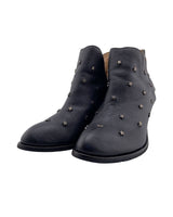 Botines en cuero con taches