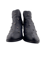 Botines en cuero con taches