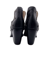 Botines en cuero con taches
