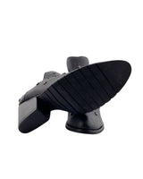 Botines en cuero con taches